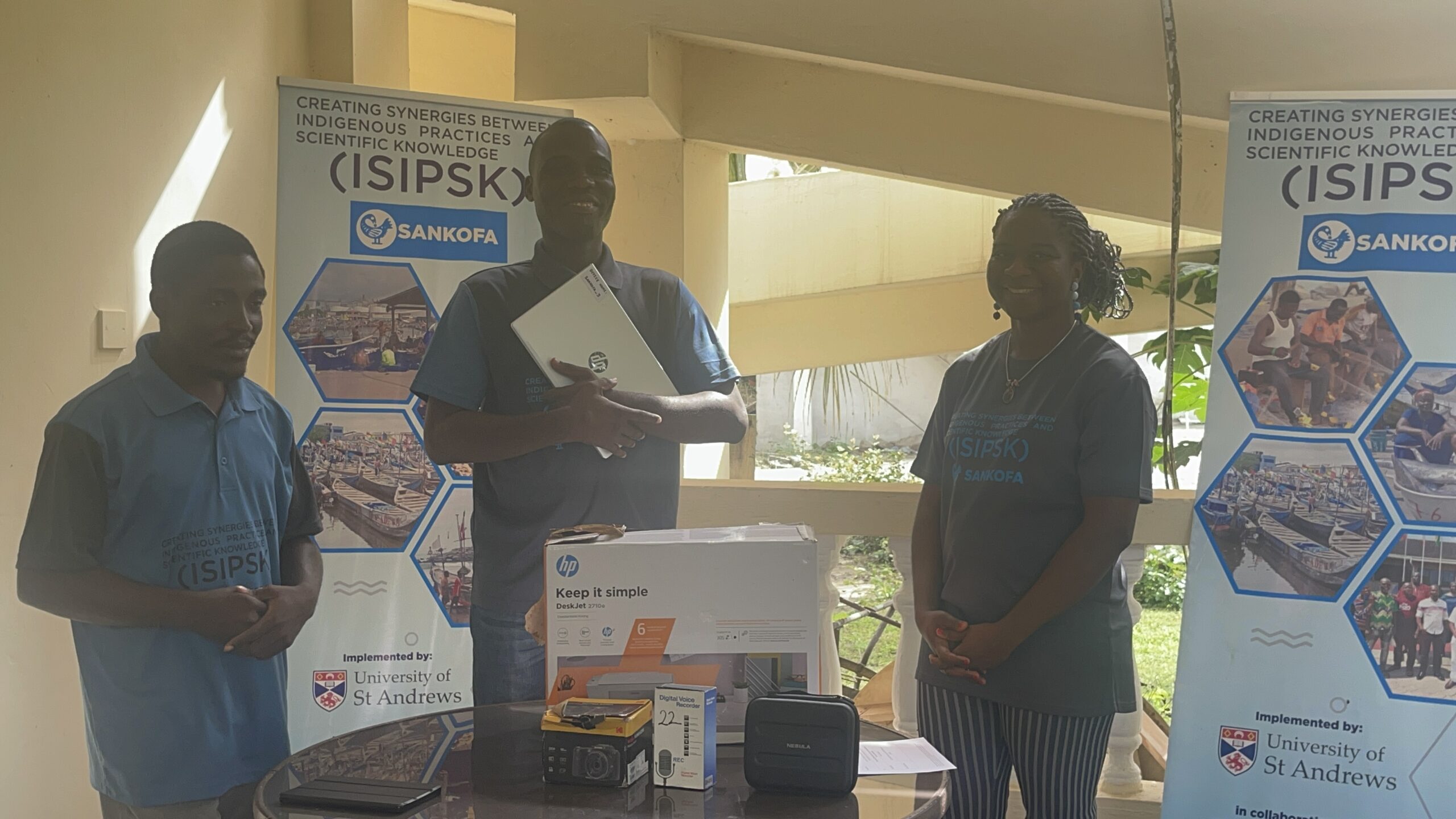 The research lead, Dr Okafor-Yarwood (positioned on the right) with Nana Kweigyah (positioned in the middle) and Kenneth Arthur (positioned on the left) of CaFGOAG during the equipment donation ceremony.